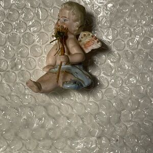 Porcelain Angel Figurine with Flower